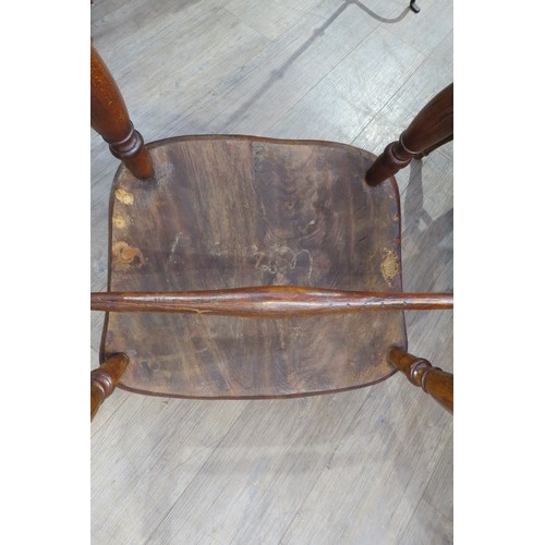 7754 - A 19th Century elm hoop back Windsor chair, H stretcher base   (R) £200