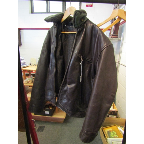 1064 - A gentleman's brown leather jacket with faux fur collar