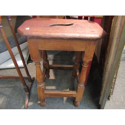 1077 - An oak stool on turned supports to stretcher base together with a side table (2)        (E) £15-25