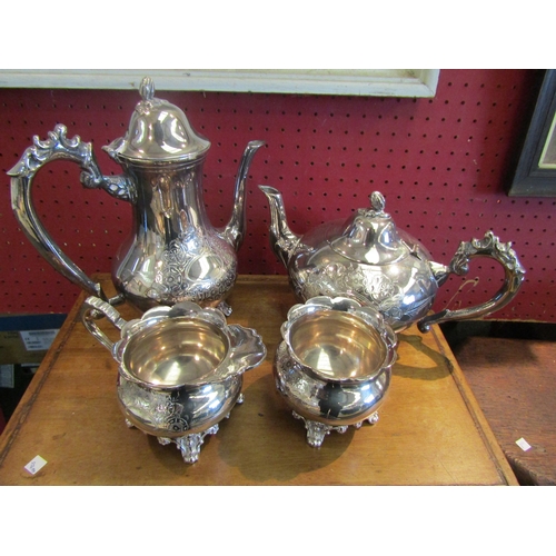 1078 - A silver plated teapot, coffee pot, jug and sugar bowl (4)