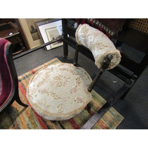 1126 - A Victorian nursery chair, ebonised turned back and legs raised on castors  (R) £15