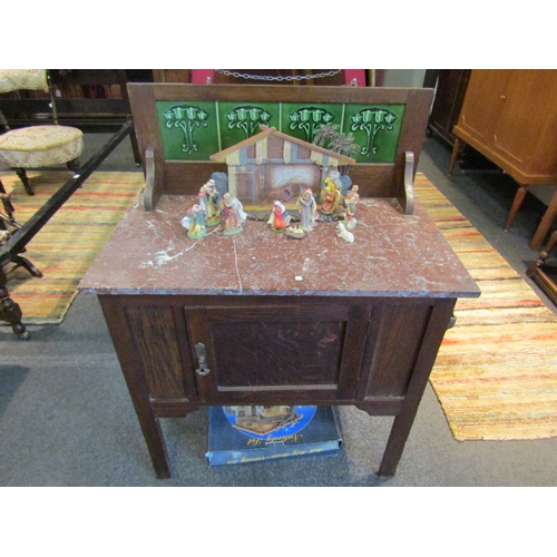 1158 - An Edwardian washstand, green Art Nouveau tiled back, marble top. 76.5cm x 43cm and 101cm high