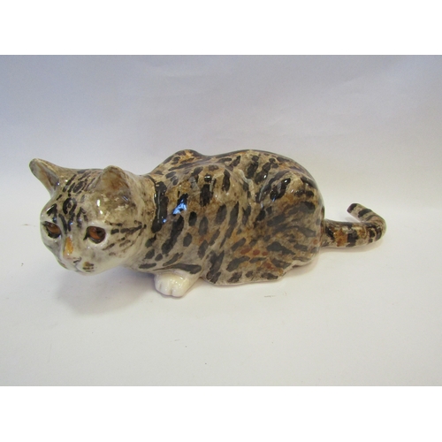 1240 - A Winstanley figure of a tabby Cat, restored tail, 37cm long