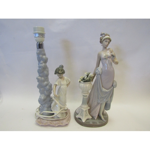 1241 - A Nao figural table lamp base and a Lladro figure of lady wearing dress stood by urn of flowers (2)