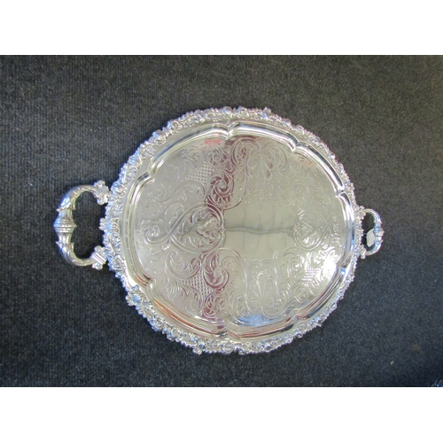 1254 - A plate on copper twin handled oval tray, 70cm