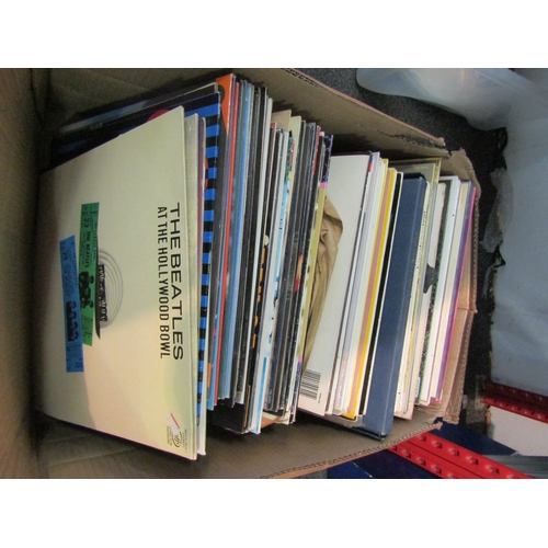 1284 - A box of records including U2, Simply Red, etc