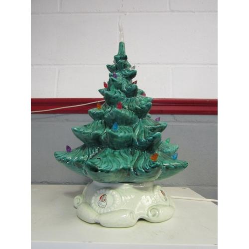 1299 - A ceramic light-up Christmas tree, 50cm tall  (some lights missing)