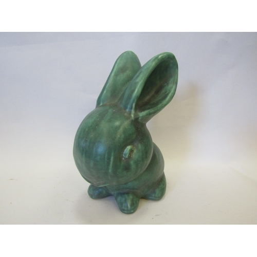 1302 - A large Bourne Denby turquoise glazed rabbit, 26cm tall