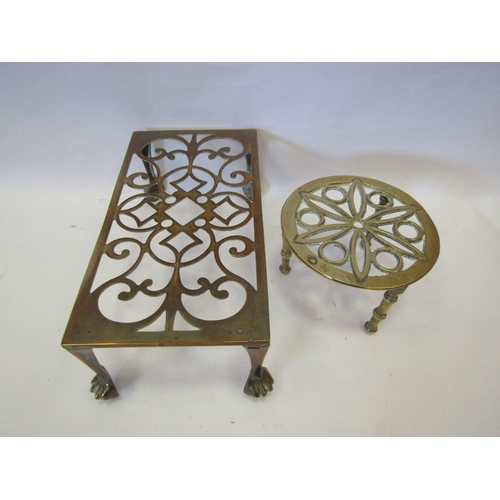 1317 - A pierced brass trivet of rectangular form and one of circular form (2)