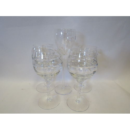 1330 - A set of four heavy crystal wine glasses, 22cm tall and a single Royal Doulton crystal wine glass, 2... 