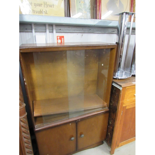 2368 - A 1950's oak and glazed bookcase and a coffee table