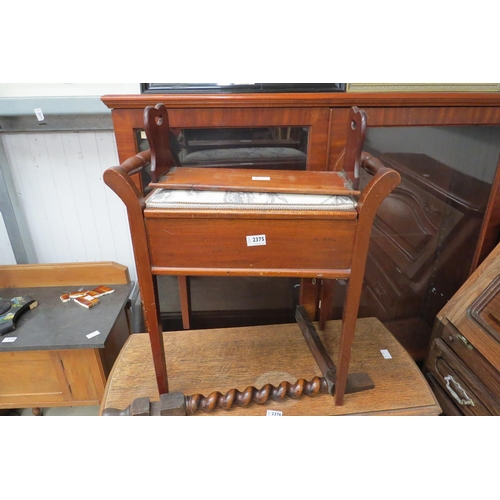 2375 - An early 20th Century piano stool with floral upholstery, together with a Victorian mahogany booksta... 