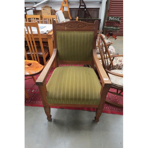 2407 - A 1930's Danish oak elbow chair with green stripe upholstery         (E) £10-15