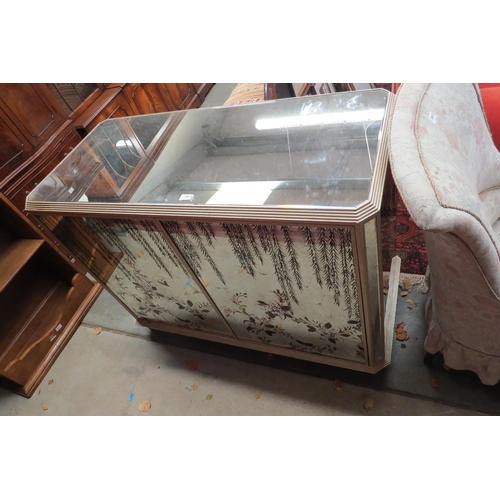 2414 - A mirrored and silvered mini bar with floral design to front, 96cm tall x 128cm wide x 60cm deep