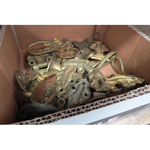 2084 - Two boxes of Victorian brass handles and hinges