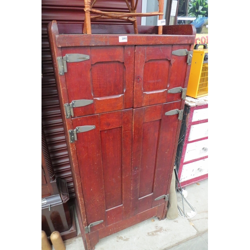 2093 - An Edwardian Industrial four door cupboard with heavy hinges