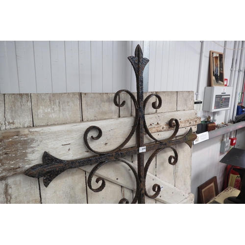 2099 - A wrought iron cross 197cm tall