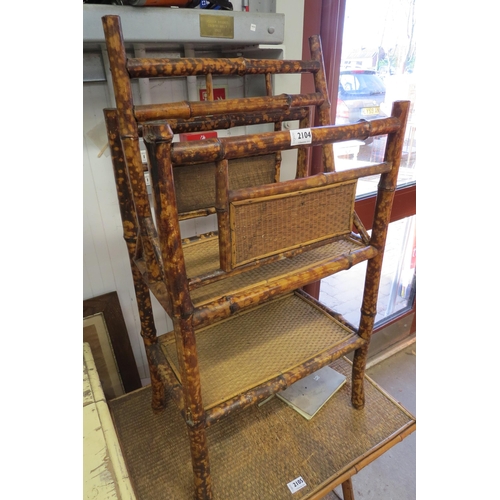 2104 - A bamboo two tier paper rack, a/f    (R)  £15