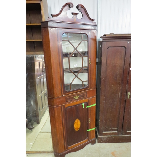 2121 - An Edwardian inalid mahogany and glazed corner cabinet