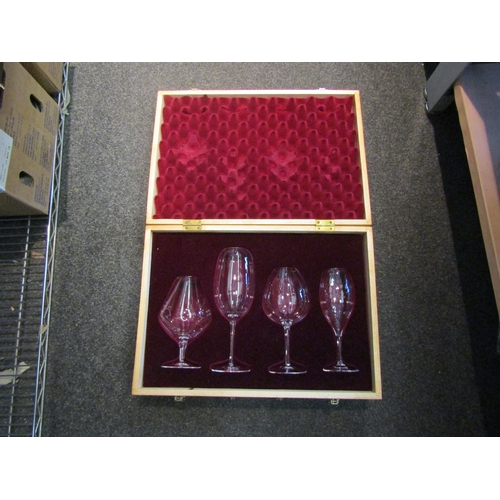 1518 - A cased wine tasting set of four glasses 