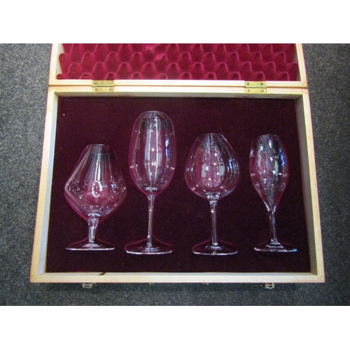 1518 - A cased wine tasting set of four glasses 