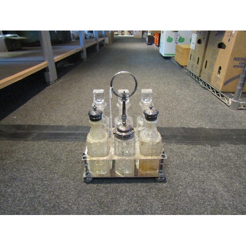 1523 - An EPNS and cut glass cruet set