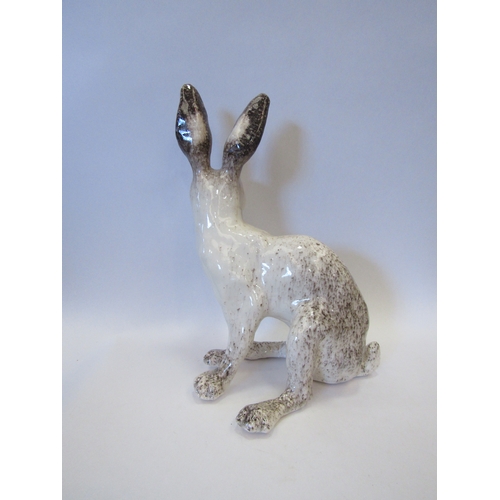 1535 - A Winstanley figure of a white Hare, restored foot, 39cm tall