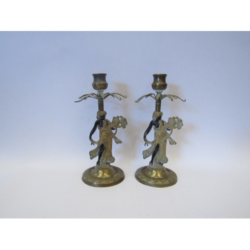 1539 - A pair of Blackamoor style Victorian candlesticks, 23cm tall