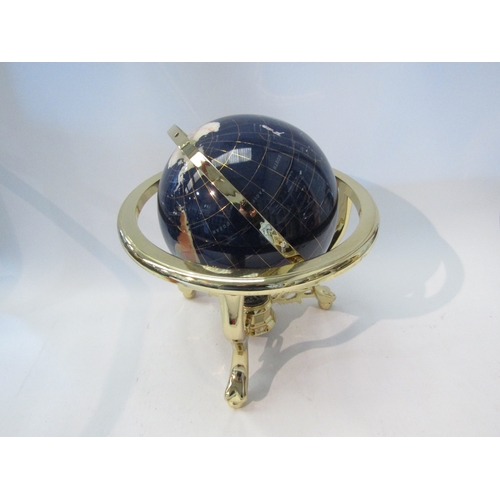 1556 - A gemstone World globe on brass effect gimbal stand