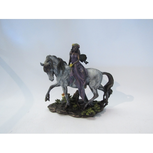 1557 - A bronze resin Shudehill figure of a fairy on unicorn, 24cm tall