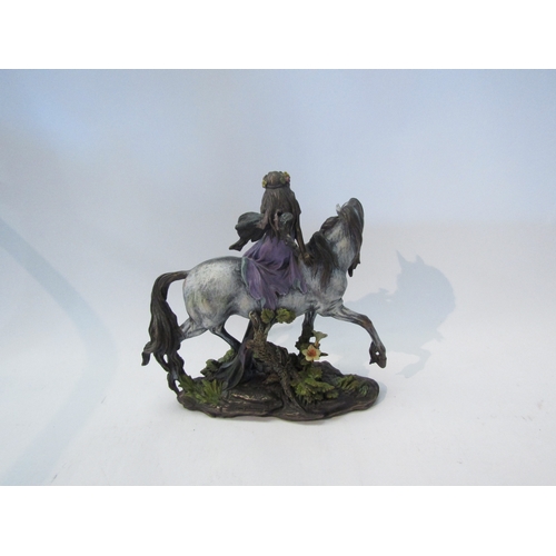 1557 - A bronze resin Shudehill figure of a fairy on unicorn, 24cm tall