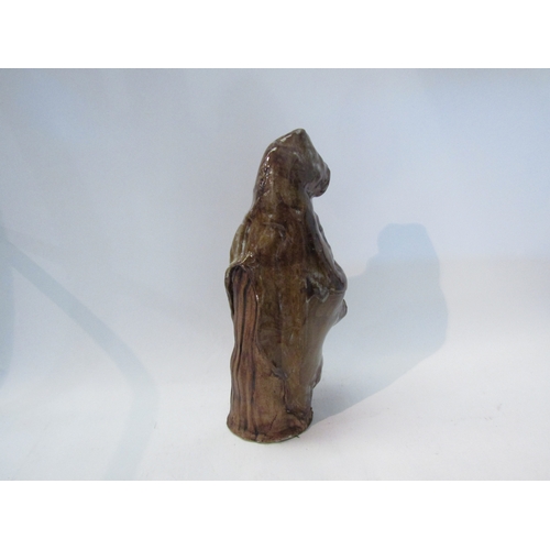 1559 - A Studio pottery caped figure, 38cm tall