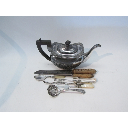 1575 - A plated teapot, gadrooned detail, and a quantity of miscellaneous flatware to include wooden handle... 