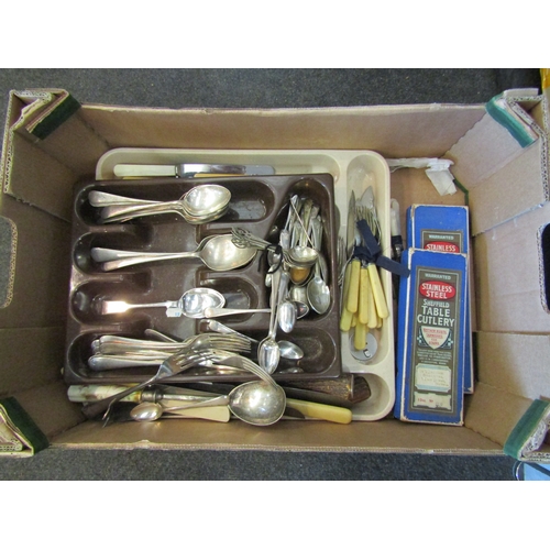 1583 - A collection of plated flatware to include bone handled carving set, bread fork, spoons, forks and k... 