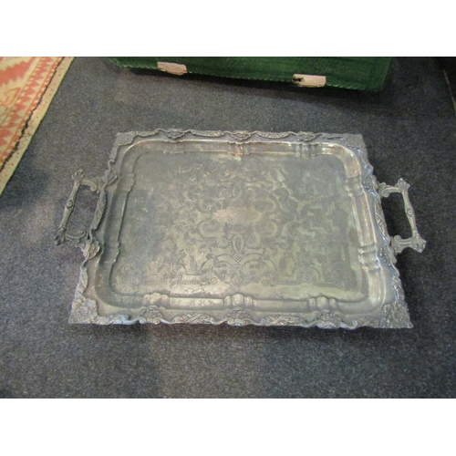 1587 - A collection of plated serving trays and platters