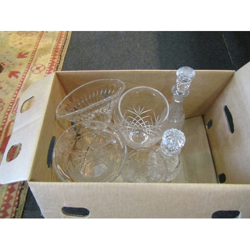 1590 - Two boxes of cut glass crystal including decanters, bowls, vases etc.