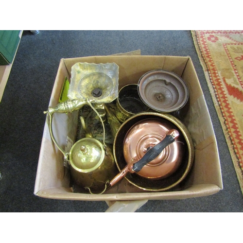 1591 - A box of miscellaneous brass and copper wares to include two footmen, kettle etc.