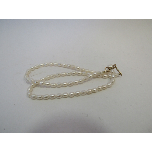 1413 - A pearl necklace with pearl droplet, 375 clasp, 42cm long   (R) £20