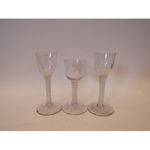 1445 - Three Georgian glasses with twisted stems, 15.5cm tallest, two have chips to rim