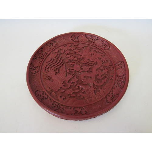 1464 - A red cinnabar style plate, 20cm diameter   (C)