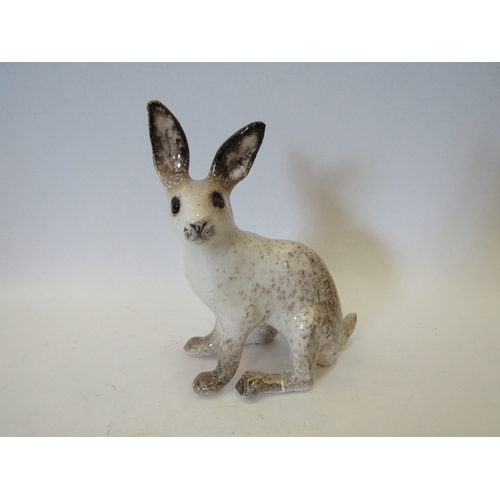 1465 - A Winstanley figure of a white Hare, back foot restored, 18.5cm tall