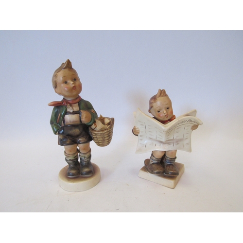 1466 - Two early Hummel figures boy reading newspaper and boy with basket. The later figure is damaged. 17.... 