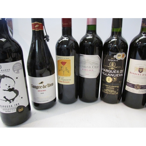 8129 - Ten bottles of various red wines, 2009 Le Grand Chai, Margaux, 2012 Barbera D'Asti, 2012 Marques de ... 