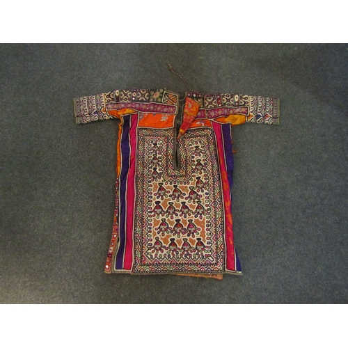 1106 - A vintage Indian silk and wool lady's tunic, heavily embroidered with silk thread and mirrored round... 