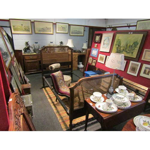 1123 - An Edwardian walnut bergere bed frame on brass castors with bobbin turned stretcher and side rails  ... 