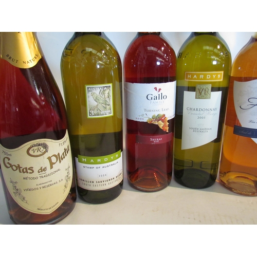 8152 - Eight bottles of mixed wines including Cava, Hardy's Chardonnay, Adnam's Cabernet rose, etc