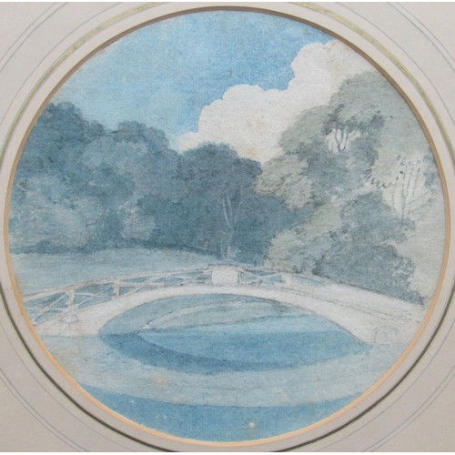 6052 - An early 19th Century watercolour of a bridge with woodland beyond. Set in a circular mount, printed... 