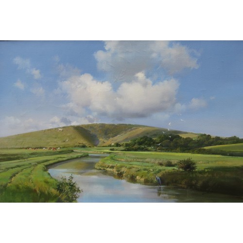 6040 - FRANK WOOTTON (1914-1998) (ARR) : An oil on canvas, bending river with heron wading, cattle grazing,... 