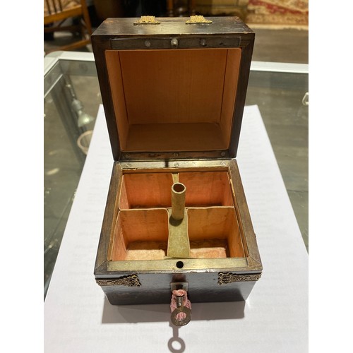 7348 - A 19th Century French scent bottle set, the case with figured hardwood veneer, with applied gilt bra... 