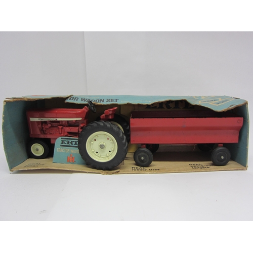 9231 - A boxed ERTL #5011 International Harvester diecast tractor wagon set